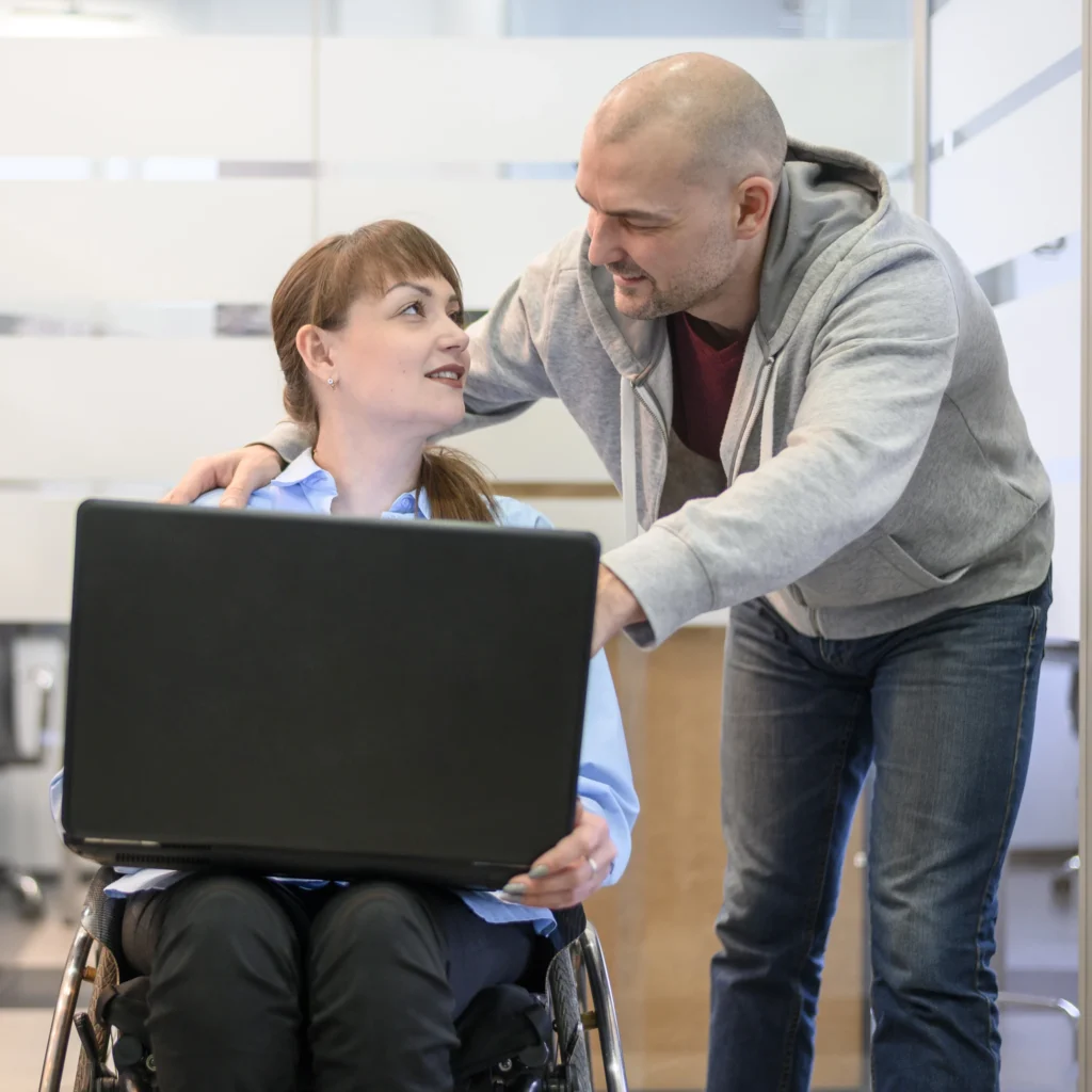 Woman sitting wheelchair friend